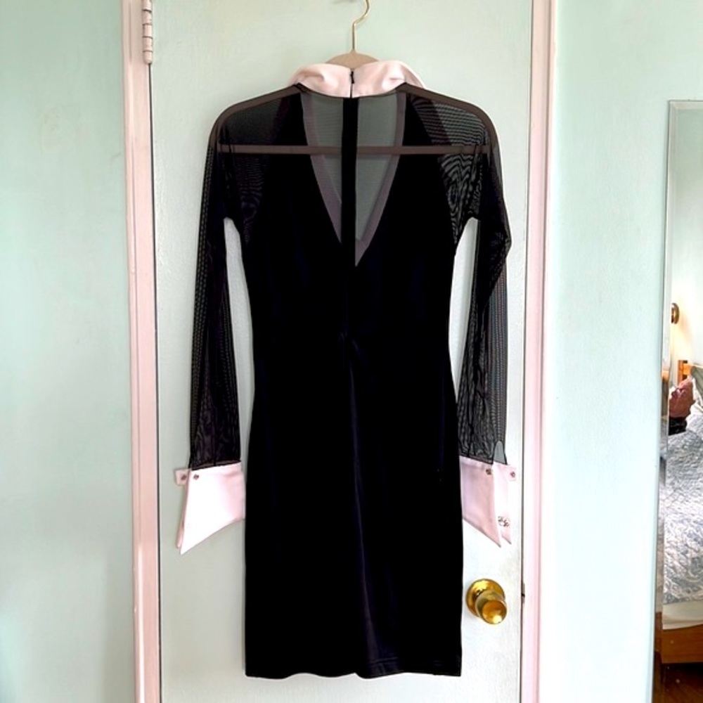 Cocktail dress w mesh sleeves & back. Jeweled buttons. L 35-1/2 in waist 27 in